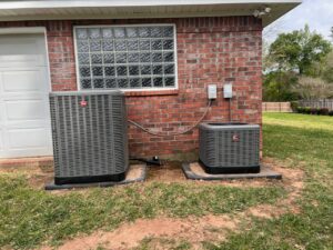 Two Rheem outdoor AC units professionally installed by Johnson's A/C & Heating in Alexandria, LA.