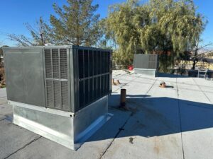 Two rooftop HVAC units installed on a commercial building by Honest AC Experts in Las Vegas, NV