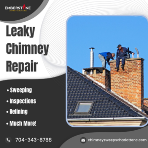 Two technicians from Emberstone Chimney Solutions on a roof, inspecting or repairing a chimney in Charlotte, NC.
