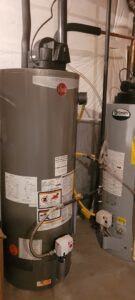 Two water heaters, a Rheem and an A.O. Smith, installed by Best Choice Mechanicals in Aurora, CO