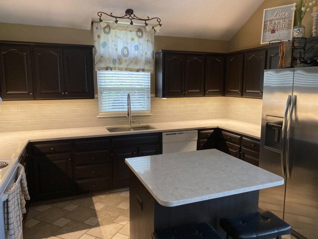 Kitchen with new under-cabinet lighting and a ceiling light fixture installed by In the Light Electrical LLC in Kansas City, KS
