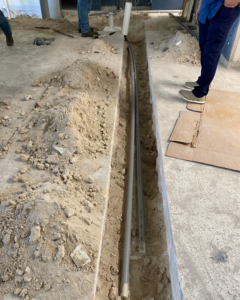 Underground electrical conduit installation for new wiring by Canseco Electrical Contractors, Inc. in Miami, FL.