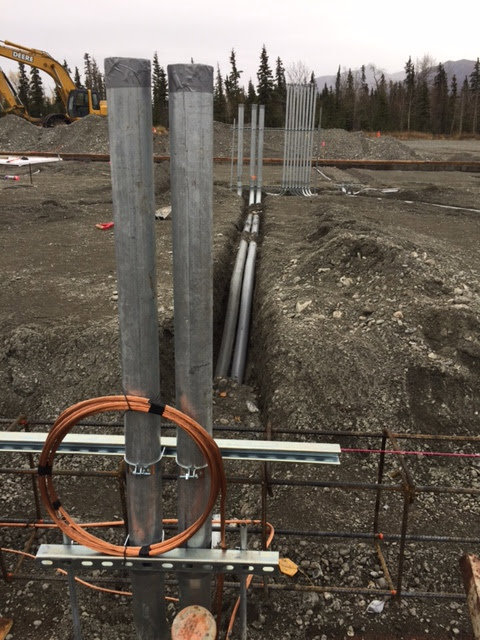 Underground electrical conduit and wiring being installed at a construction site by Premier Electric LLC in Palmer, AK.