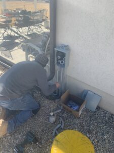 Underground electrical conduits laid in a trench for installation by Live Wire Service in Salt Lake City, UT.