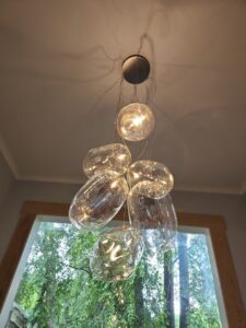 Installation of unique clear glass pendant lights by Armenergo Electrician in Rockville, MD