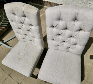 Before and after comparison of two upholstered dining chairs, one dirty and one clean, by Gemini Carpet Cleaning in Lincoln, NE