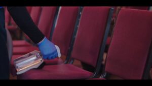 A professional performing upholstery disinfection on chairs, a service by Winston Salem Carpet Cleaning by Hernandez in Greensboro, NC.