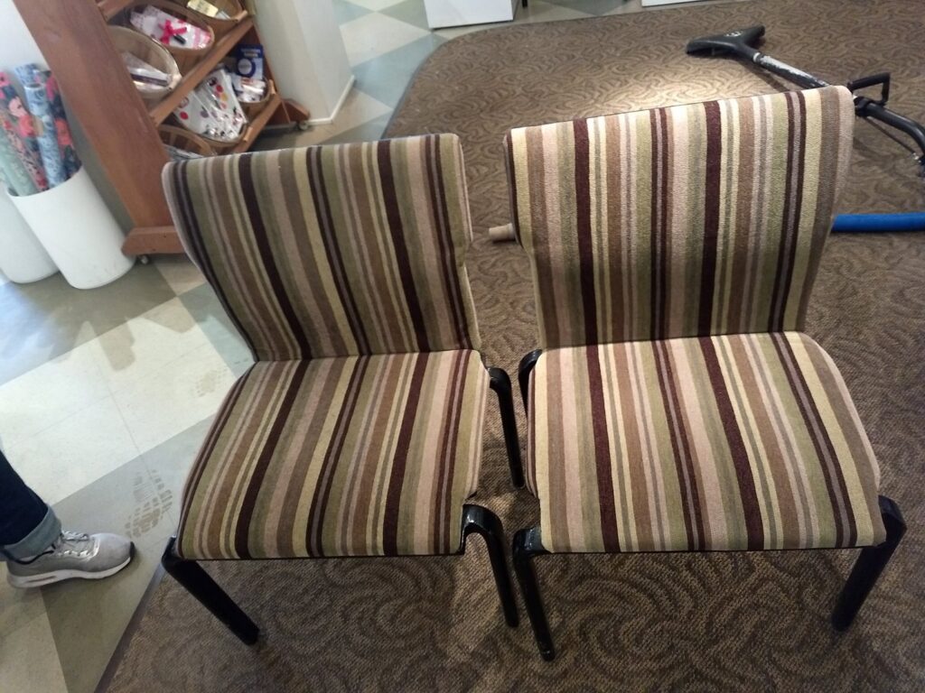 Two striped upholstered chairs on a carpet, indicating upholstery cleaning services by Carpet Masters of Albuquerque, NM.