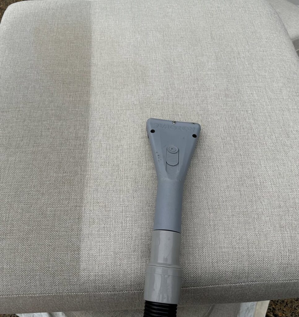 An upholstery cleaning tool being used on furniture by Great Day Carpet & Tile Cleaning LLC Desoto in Olive Branch, MS.