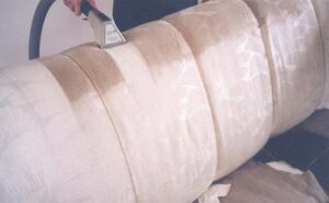 Professional upholstery and furniture cleaning in progress on a sofa by ALL Services of NC in Greensboro, NC