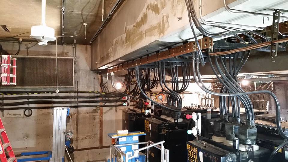 Utility room showcasing complex electrical infrastructure and wiring by Titan Electric in Bellevue, WA.