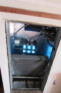 An interior view of an air handler unit with a UV light system installed by Purair Hawaii in Honolulu, HI.