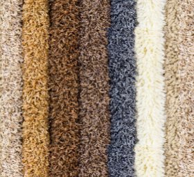 Close-up view of various carpet textures and colors available at Jordan's Flooring in Martinsburg, WV