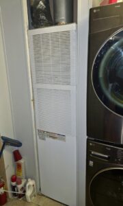 A vertical furnace unit installed in a residential space by Lee's Heating & Cooling in Pueblo, CO.