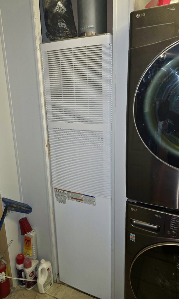 A vertical furnace unit installed in a residential space by Lee's Heating & Cooling in Pueblo, CO.