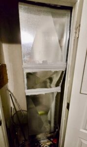 Vertical HVAC ductwork installed in a residential utility space by Lee's Heating & Cooling in Pueblo, CO.