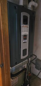 A vertically mounted Trane indoor HVAC unit, installed by Southern Oregon Heating & Air Conditioning in Medford, OR