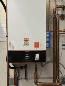 A Viessmann boiler and heating system with copper piping installed by Crome Mechanical Inc. in Cedar Springs, MI