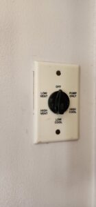 A vintage HVAC control panel with settings for vent and cool by Utah Mechanical Heating and Air Conditioning in South Ogden, UT.