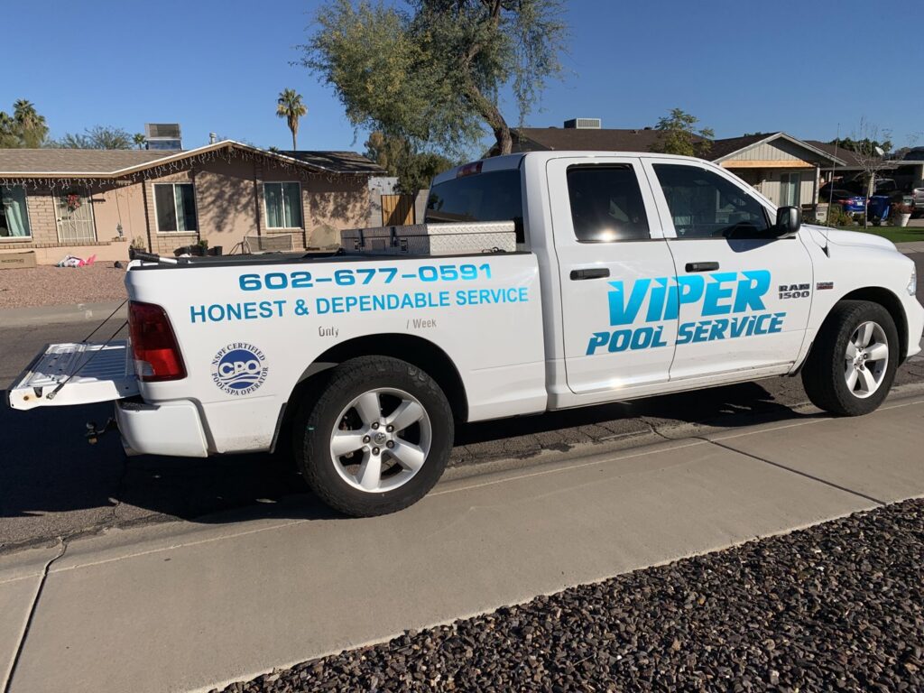 A white pickup truck with 'Viper Pool Service' branding for Arizona Pool Stuff SW in Phoenix, AZ