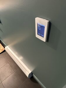 Wall control panel and baseboard heating installed by Breakers Electric LLC for a home in Dover, NH.