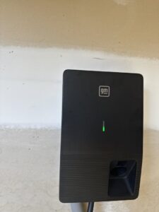 A wall-mounted EV charger installation completed by LivElectric in Garner, NC.