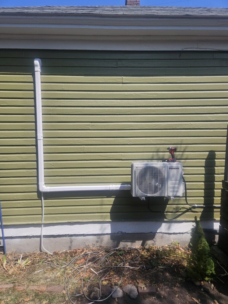 A wall-mounted mini-split condenser unit installed by 406 Heating & Cooling LLC in Missoula, MT.
