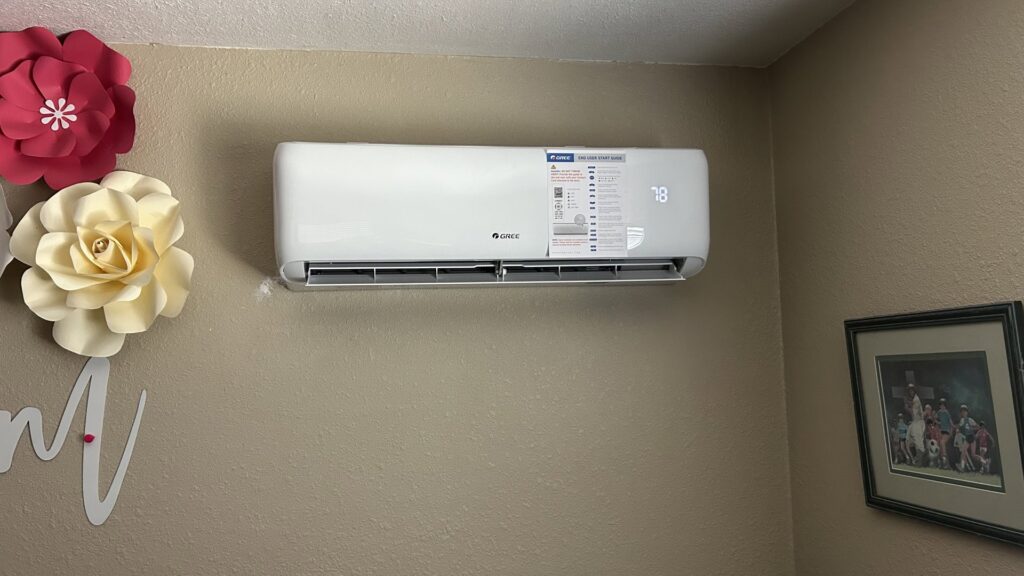 A wall-mounted mini-split HVAC system with a digital display, installed by Service Kings Heating and Air in Jamestown, ND.