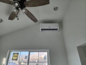 A wall-mounted mini-split HVAC unit installed in a room by Cutting Edge HVAC LLC in Orem, UT.