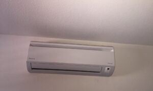 A wall-mounted Daikin mini-split HVAC indoor unit installed by DeHart Plumbing, Heating, & Air in Sparks, NV.