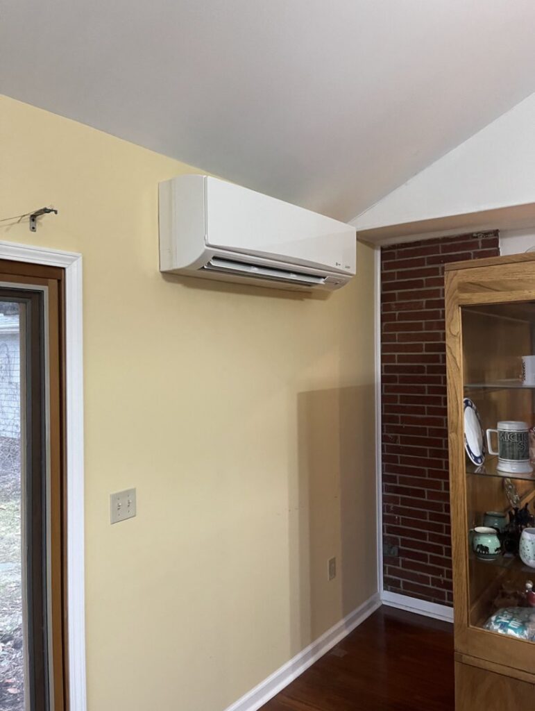 A wall-mounted indoor mini-split unit installed in a home by Comfort Craftsman Heating & Cooling in Westland, MI.