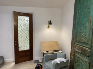 A modern wall sconce light fixture installed in a home by Southern Electrical Services, LLC in Leesburg, VA.