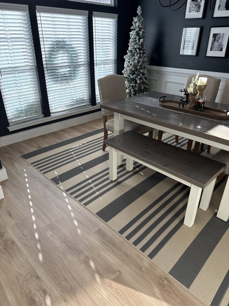 A spacious room featuring a new wall-to-wall carpet installation by On Point Flooring in Concord, NC