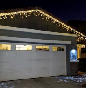 Warm white Christmas lights professionally installed on a house by GET LIT Electrical Services LLC in Glendale, AZ.