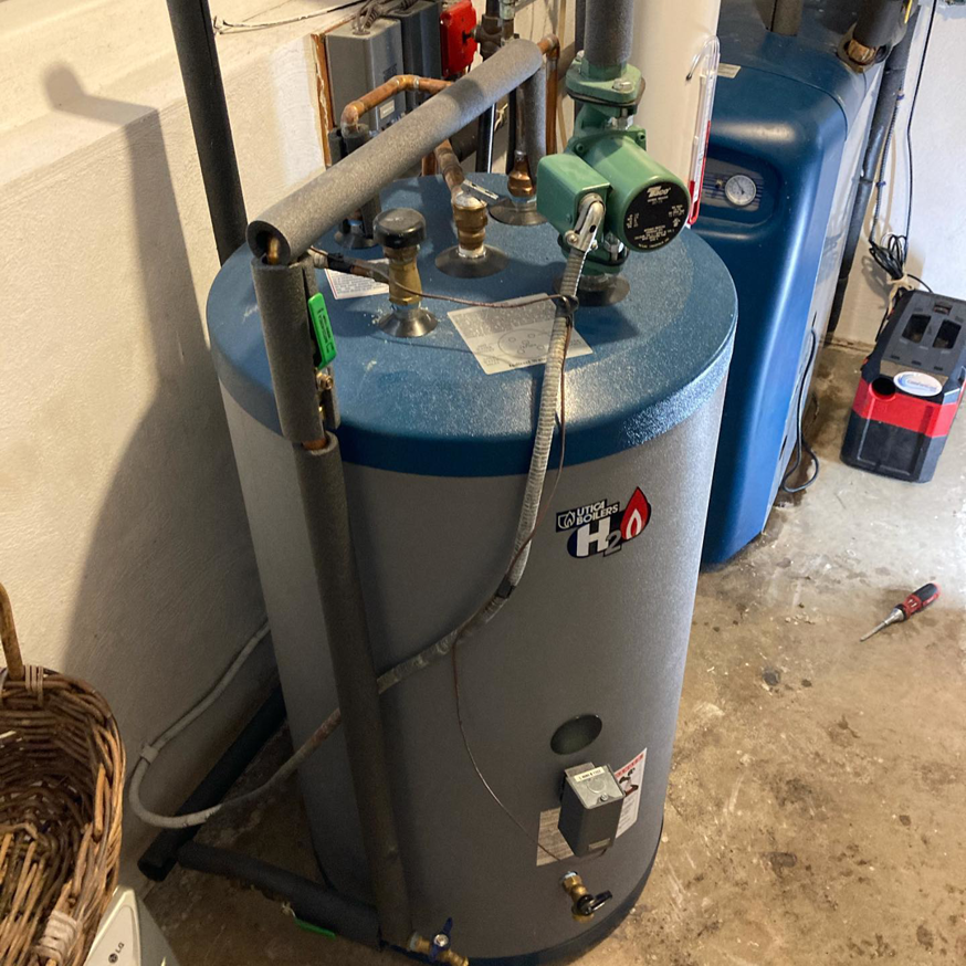 A water heater and boiler system installed by ComfortCool Mass, an HVAC contractor in Quincy, MA