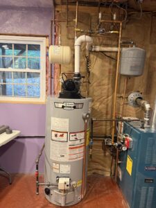 A water heater and Burnham boiler heating system installed by Revolution HVAC in Owings Mills, MD.