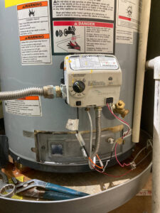 Close-up of a water heater's electrical control panel and wiring connections by Ace Electric Inc. in Valdosta, GA.