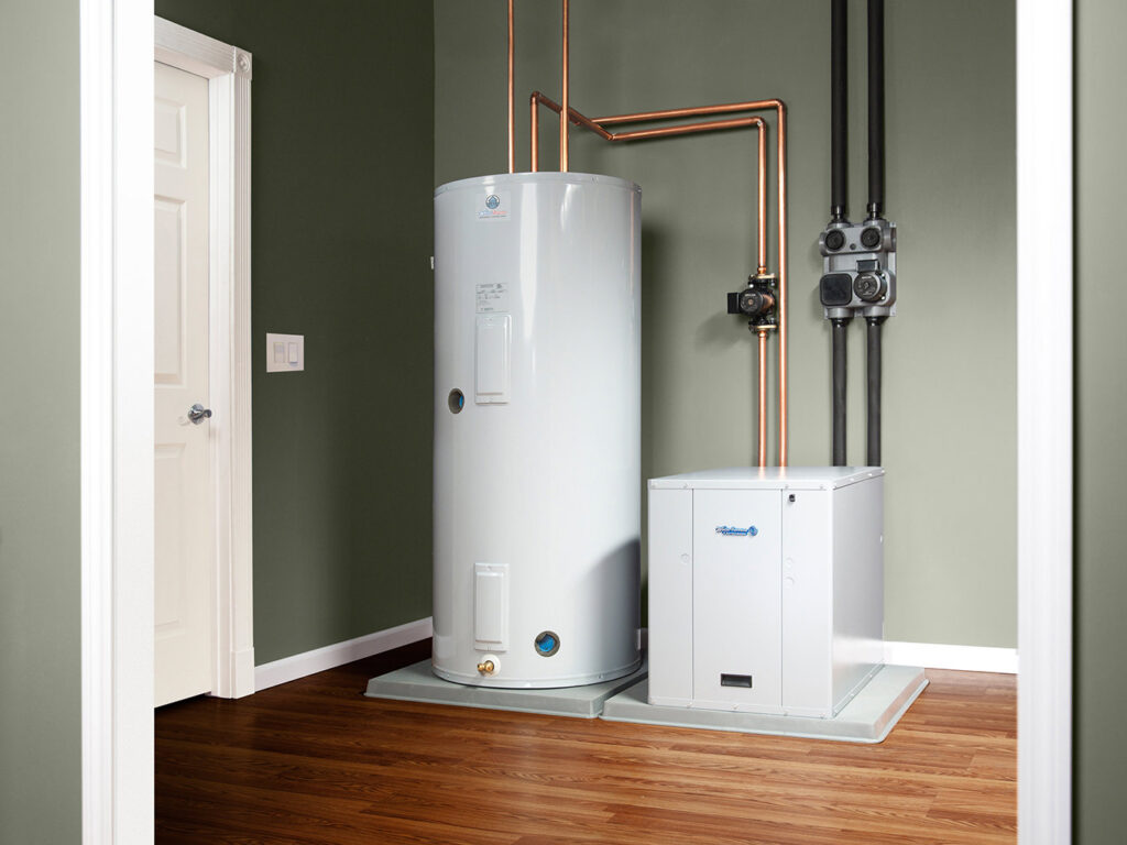 A water heater and heating system components installed in a utility room by Garden City Plumbing & Heating in Missoula, MT