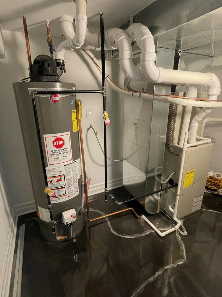 A new water heater and HVAC system installation with extensive piping and ductwork by JL Heating & AC LLC in Chicago, IL