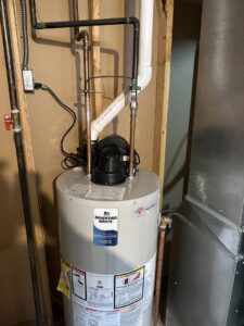 A new water heater installation with copper piping by All Around Heating & Cooling, providing heating services in Akron, OH.