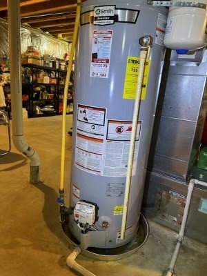 A new Smith ProLine water heater installed in a basement by Markool Heating Cooling Plumbing in Frederick, MD.