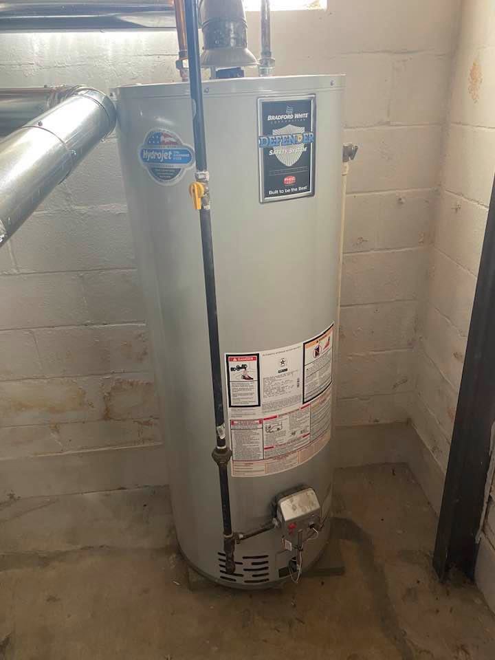 A Bradford White Defender water heater installed by Good Helpers Heating, Cooling & Labor Services LLC in Detroit, MI.