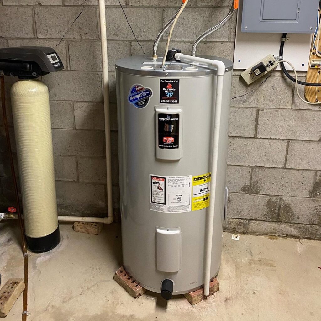 A new water heater and water softener installed in a basement by PureAir HVAC in Bel Air, MD.