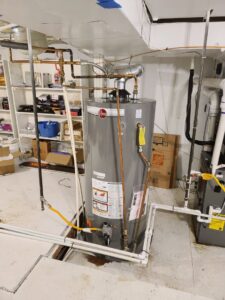 A new water heater installation with copper piping by Thin Air Heating and Cooling in Arvada, CO.