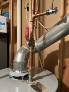 New water heater installation with copper piping and galvanized venting by Bowers Heating and Air Conditioning in Wichita, KS