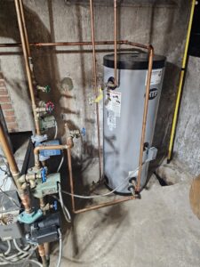 A water heater installation with new copper piping and pumps by Tony Marzano Plumbing & Heating LLC in Hartford, CT.