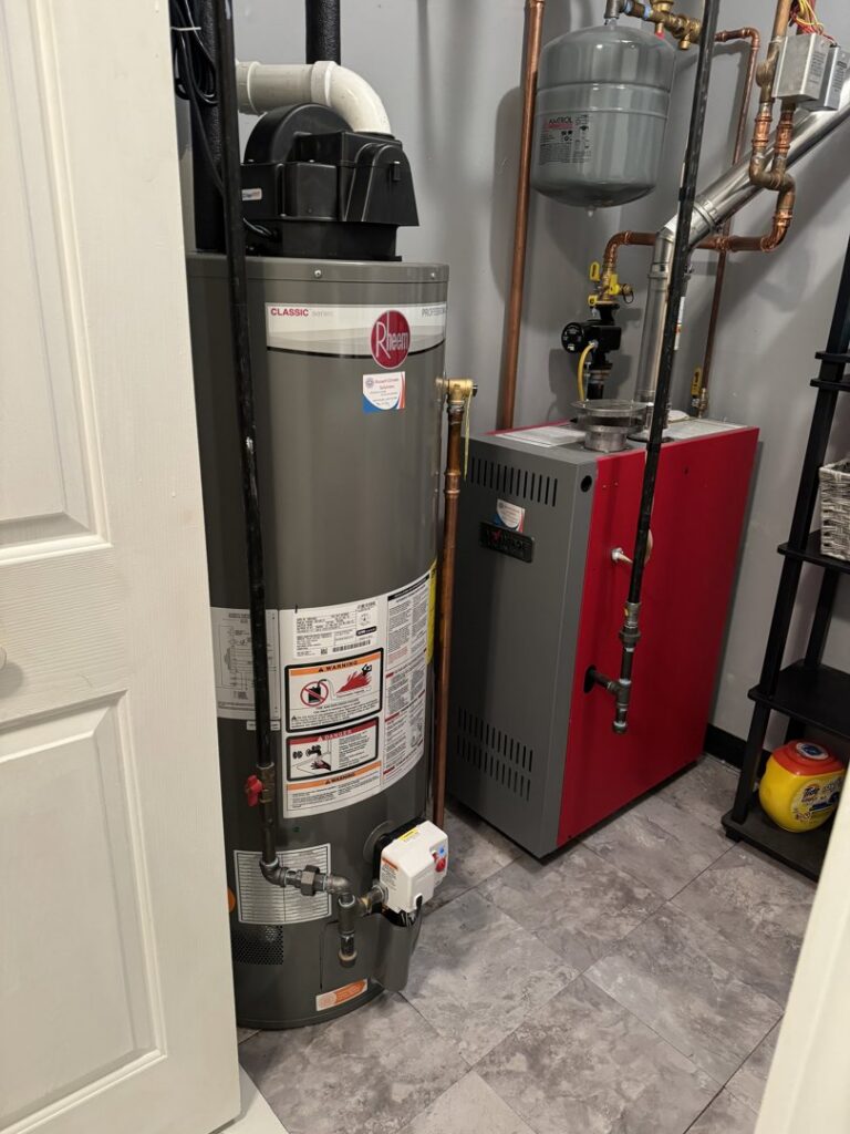 A water heater and a red boiler system installed by Russell Climate Solutions in Schenectady, NY.