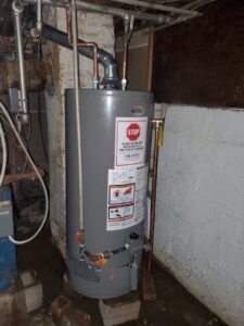 A water heater replacement in a basement by Medina's Heating & Air Conditioning in Joliet, IL.