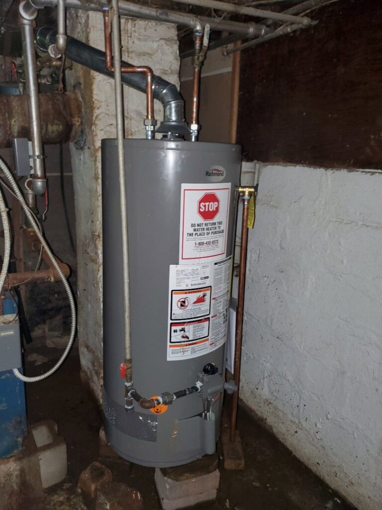 A water heater replacement in a basement by Medina's Heating & Air Conditioning in Joliet, IL.