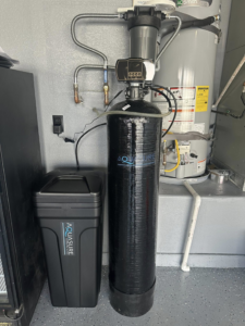 Professional installation of an A.O. Smith water heater and Aquasure water softener system by CaliFam Services in Las Vegas, NV.